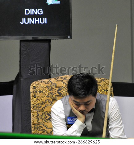 BANGKOK,THAILAND-MARCH 24: Ding Junhui of China in action during 2015 The Players Championship at Montien Riverside Hotel, Bangkok on March 24,2015 in Bangkok,Thailand