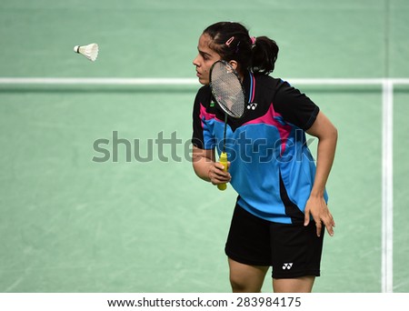 INCHEON, SOUTH KOREA- SEPTEMBER 20: Saina Nehwal of India in action of women\'s team of badminton the 2014 Asian Games at Gyeyang Gymnasium on September 20, 2014 in Incheon, South Korea.