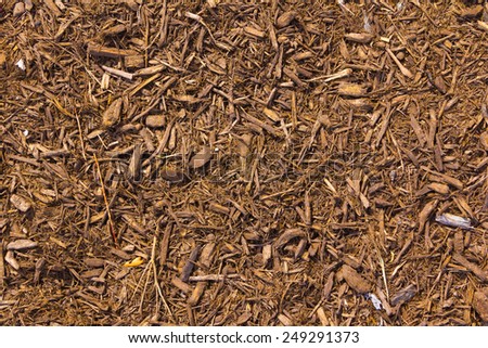 brown mulch with a touch of red