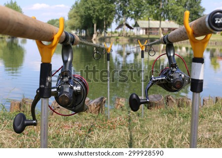 fishing rods with reels at lake fishing