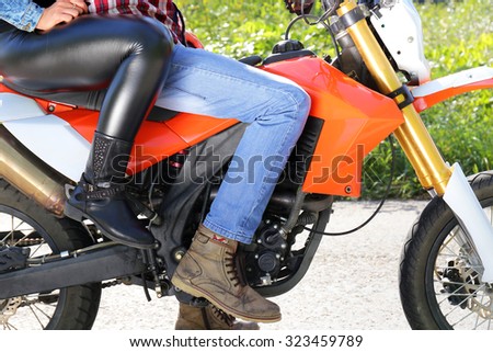 Biker Man and woman  riding on motorcycle