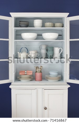 Cabinet with kitchen objects