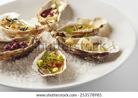 Oysters plate served on the sea salt