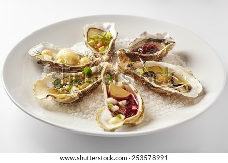 Oysters plate served on the sea salt