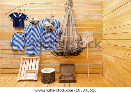 Fishing, sea stage-property and set-design in a photographic studio