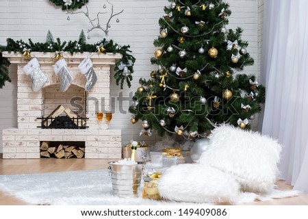 Daily interior decked out with Christmas tree and fireplace