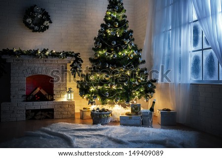 Evening Interior With Elegant Christmas Tree And Fireplace