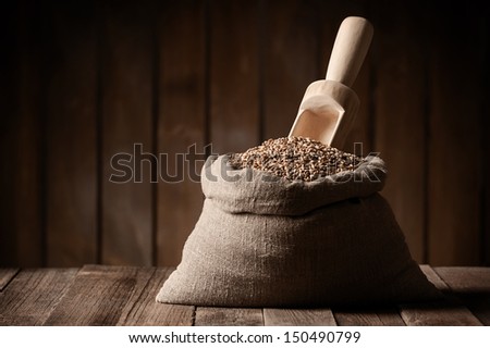 Bag with wheat and dustpan