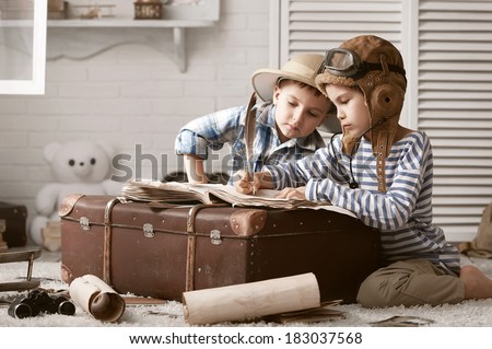 Two boys in the images of the pilot and the traveler fill your travel book