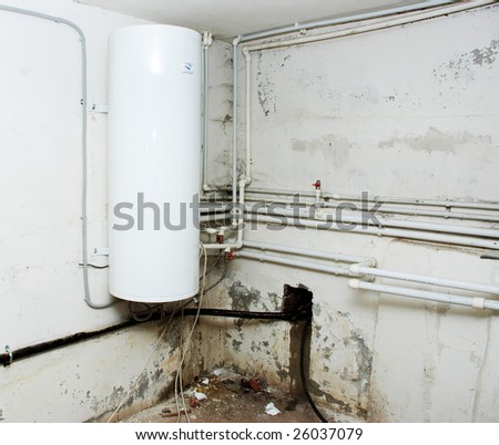 Water heater, pipes, an electricity, the water drain and heating in a basement