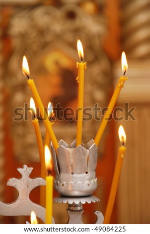 Church candles in a candlestick