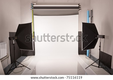 Interior and the equipment of a photographic studio ready for realization of photosession.
