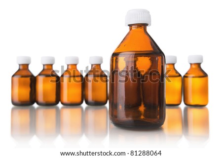 Medical bottles in the row isolated on white