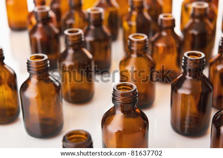Medical bottles on white