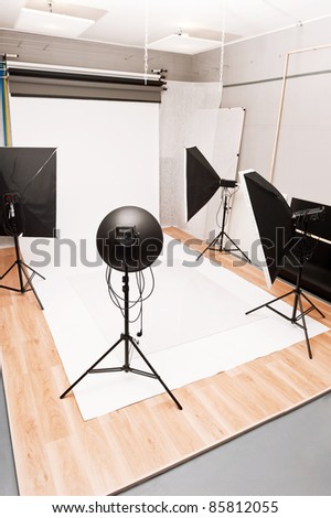 Interior and the equipment of a photographic studio ready for realization of photosession.