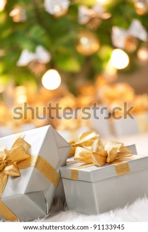 Boxes of presents under the Christmas tree