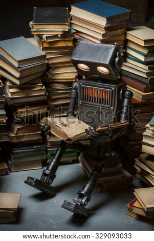 Robot-child reading a book in the workshop of its creator
