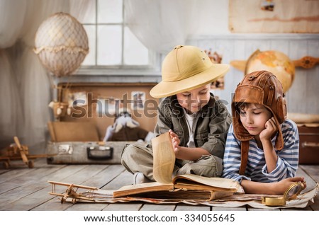 Two boys in the pilot study and the tourist old book travel