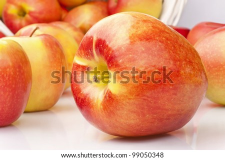 Ripe juicy apples on a white background