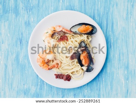 Pasta With Seafood On A Plate On A Blue Background