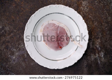 Fresh Ham On A White Plate Top View