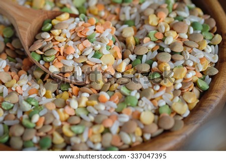 Peas, lentils, rice and barley in a bowl Organic food