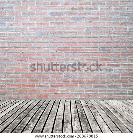 old wooden floor on brick wall grung background