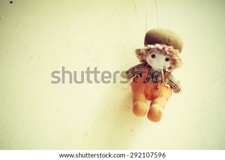 soft toy on the old grunge wall  retro and vintage style Soft focus Process color.