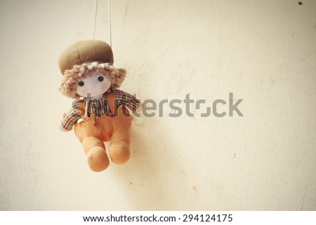 soft toy on the old grunge wall  retro and vintage style Soft focus Process color.