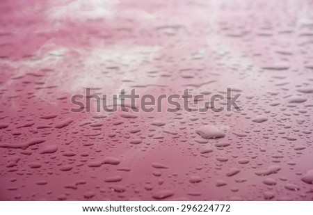 water drop on red and white  background.