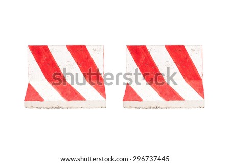 Red and white concrete barriers blocking the road. Isolated on white background.