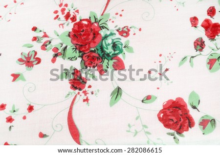 Vintage rose paint on fabric background