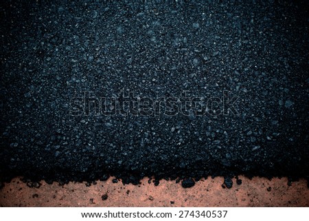 Dark vignette road surface of the asphalt