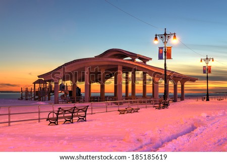 The boardwalk along Brighton Beach and Coney Island Beach, New York, also known as Little Odessa in the wintertime covered in snow.