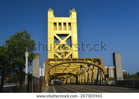 The Tower Bridge (1935) is a vertical lift bridge that crosses the Sacramento River in Sacramento, California.