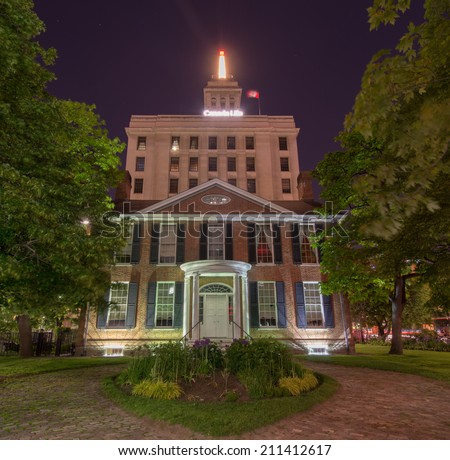 TORONTO, CANADA - JUNE 14, 2014: A frontal view of the Campbell House Museum at night in Toronto. The Campbell House is the oldest remaining house from the original site of the Town of York.