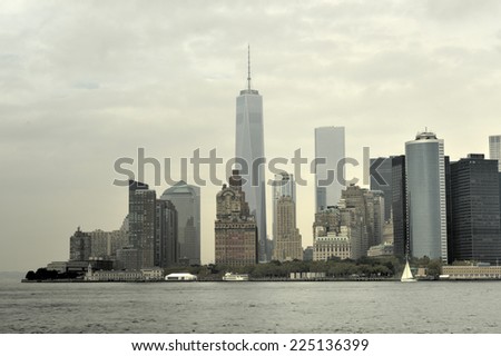 NEW YORK, NEW YORK - SEPTEMBER 21, 2014: View of Downtown Manhattan, New York from the East River on a fall cloudy day.