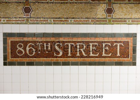 NEW YORK, NEW YORK - NOVEMBER 2, 2014: 86th Street Subway Station mosaic tile sign in New York City.