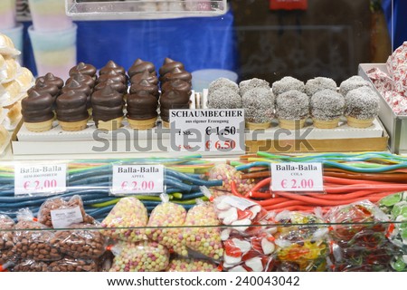 VIENNA, AUSTRIA - NOVEMBER 30, 2014: Christmas Market at Rathausplatz in Vienna, Austria. Kiosk selling the traditional sweets.