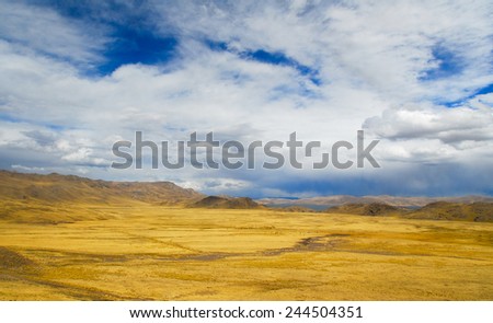 Road Cusco-Puno, Peru, South America. Sacred Valley of the Incas. Spectacular nature of mountains and blue sky.