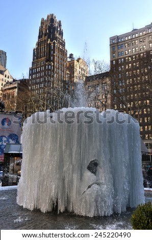 NEW YORK, NEW YORK - JANUARY 10, 2015: Josephine Shaw Lowell Memorial Fountain in Bryant Park, Midtown, Manhattan. It has frozen over during the cold winter.