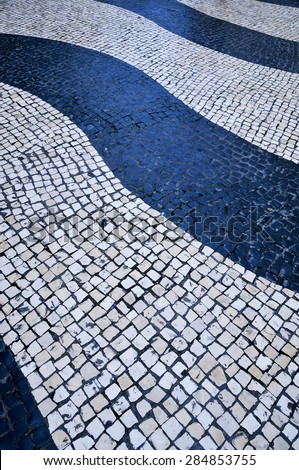Wave-motif tiles at Largo do Senado - Senate, Senado Square: Portuguese pavement, Macau, China.