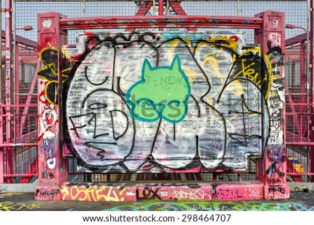 Brooklyn, New York - July 15, 2015: The Williamsburg Bridge Plaque in Brooklyn, New York. It is covered in graffiti and vandalized.