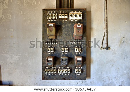 Electrical panel in the abandoned ghost diamond town of Kolmanskop in Namibia, which is slowly being swallowed by the desert.