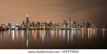 Chicago - September 7, 2015: Panoramic view of the Chicago Skyline over Lake Michigan at night.