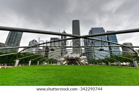 Chicago - September 8, 2015: The Jay Pritzker Pavilion and Great Lawn in Chicago, USA. The Pavilion, designed by Frank Gehry, is an outdoor performing arts venue.