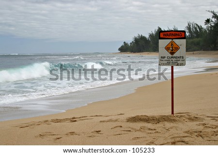 Beach with Rip Currents Sign - You could be swept out and drown - If in doubt, don't go out