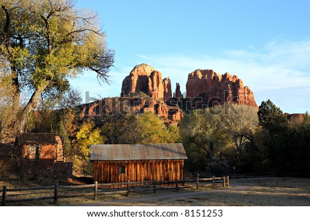 Cathedral Rock from Red Rock Crossing near Sedona, Arizona. Weathered farm building in the foreground
