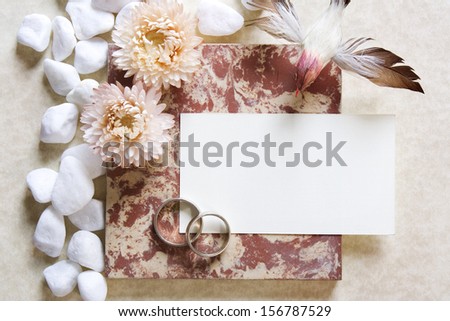 Wedding background with wedding bands on the decorative stone