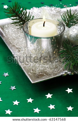Silver, baroque christmas candle, still life